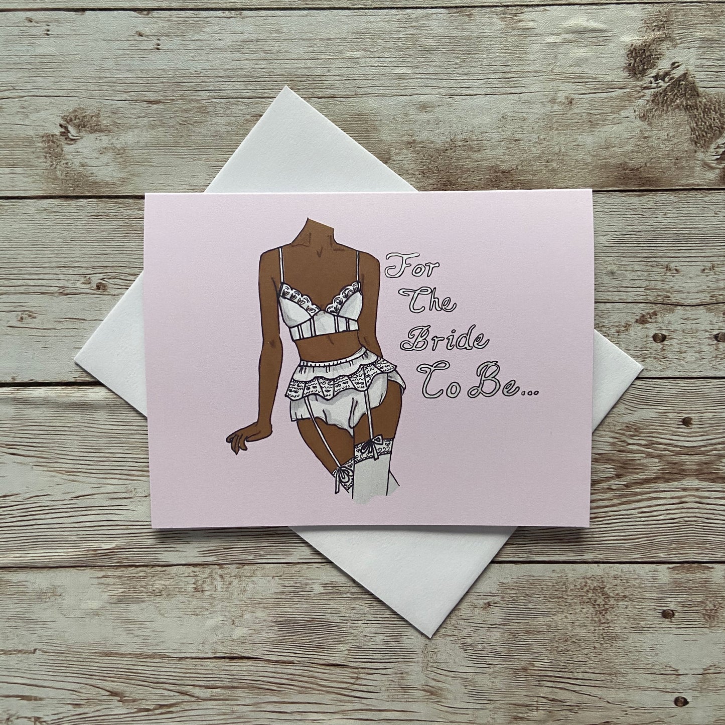 greeting card with illustration of a woman's body in white lingerie