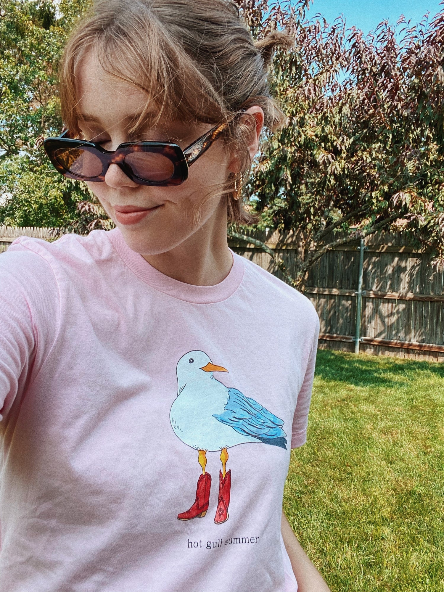 girl wearing a seagull t-shirt