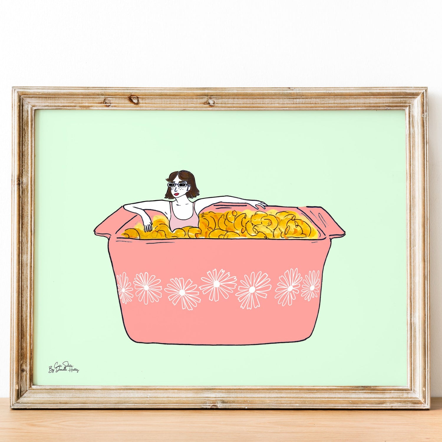 framed wall art of pyrex dish with mac n cheese