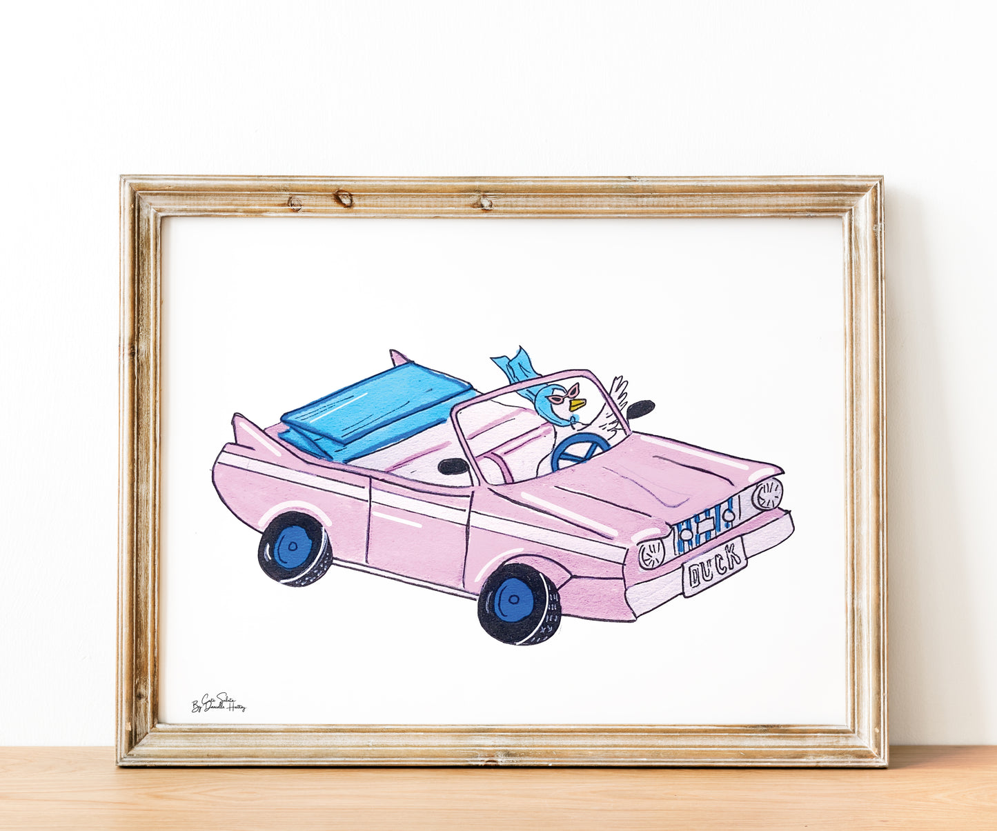 wall art of duck sitting in pink convertible